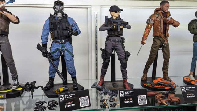 Statues of Smoke and Ash sit on display at Comic Con.