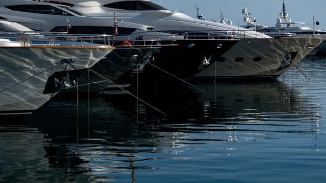 Yachts are moored in the port of Cannes on March 31, 2022 in Cannes, southern France. 