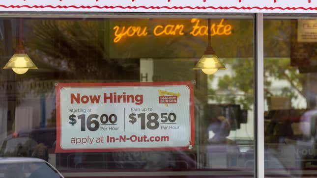 Now hiring sign at In-N-Out restaurant.