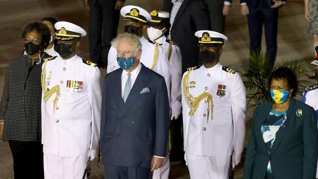 Prince Charles, Prince of Wales is greeted by Dame Sandra Mason (in green) as he arrives at Bridgetown Airport on November 28, 2021 in Bridgetown, Barbados. The Prince of Wales arrived in the country ahead of its transition to a republic within the Commonwealth. This week, it formally removes Queen Elizabeth as its head of state and the current governor-general, Dame Sandra Mason, will be sworn in as president.