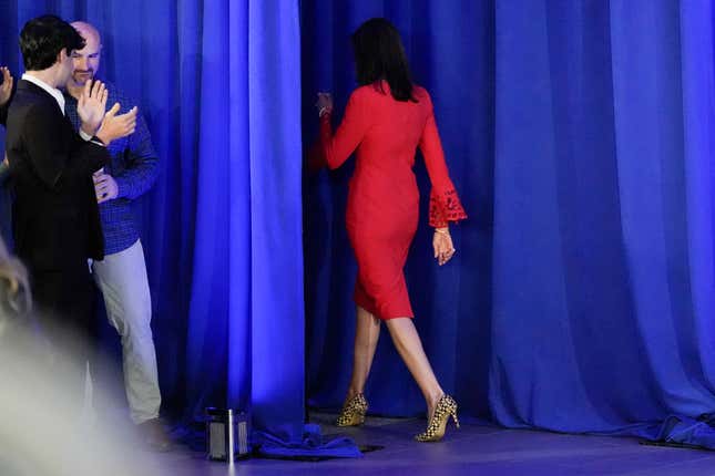 Republican presidential candidate former UN Ambassador Nikki Haley walks off after speaking during a news conference, Wednesday, March 6, 2024, in Charleston, S.C., as her son, Nalin Haley, left, looks on and applauds. (AP Photo/Chris Carlson)