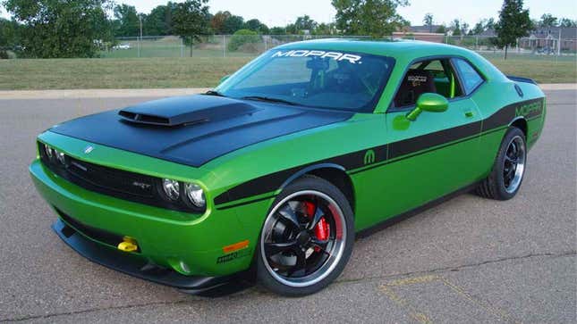 A photo of a Dodge Challenger with a hood scoop. 