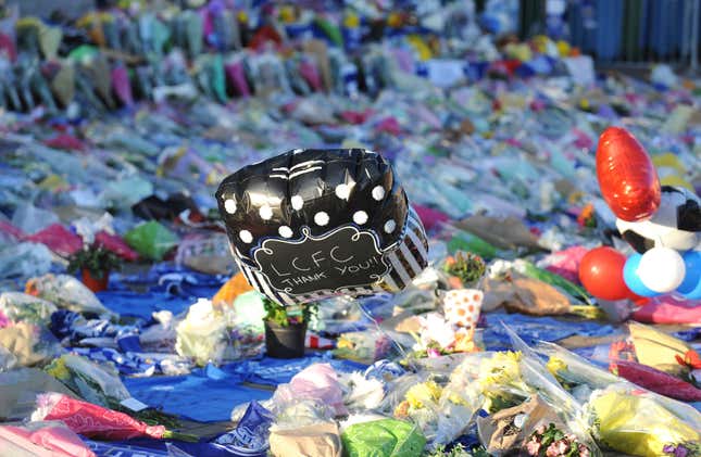 CORRECTS DATE OF INQUIRY ANNOUNCEMENT TO WEDNESDAY, SEPT. 6, 2023 FILE - Tributes are placed outside Leicester City Football Club, Leicester, England, Oct. 29, 2018, after a helicopter crashed in flames Saturday. A damaged tail rotor was to blame for a helicopter crash that killed Vichai Srivaddhanaprabha, the owner of English soccer club Leicester, and four others in 2018, an accident inquiry said Wednesday, Sept. 6, 2023. (AP Photo/Rui Vieira, File)