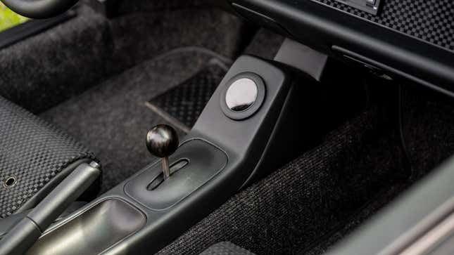 A photo of the shifter in an EV converted Porsche. 