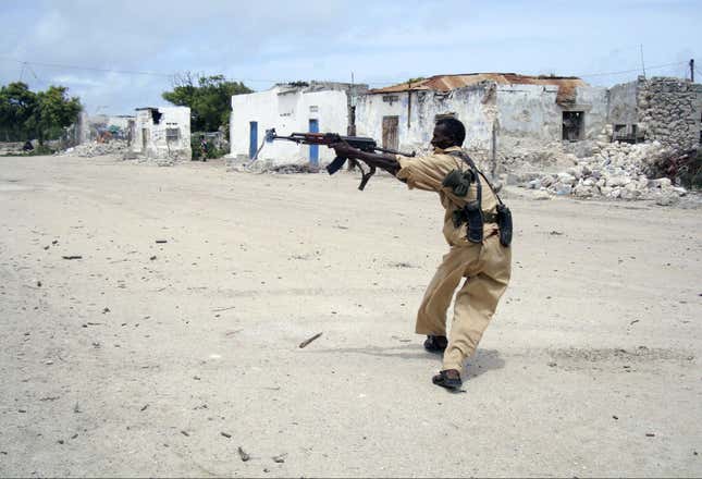 A Somali government soldier fires at Islamist fighters in Mogadishu on Jul. 11, 2009.