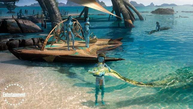 A Na'vi child holds the head of a big lizard on the beaches of Pandora in this concept art from Avatar 2.