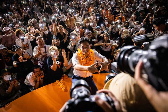 Pita Limjaroenrat, the Move Forward Party's candidate for Prime Minister in the upcoming election, greets his supporters at a massive rally