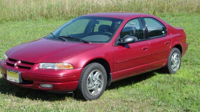 A red 1996 Dodge Stratus