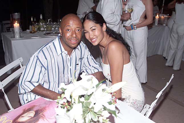 Russell Simmons, left and Kimora Lee during Puff Daddy - 2000 Annual White Party at Puff Daddy estate in East Hampton, New York, United States.