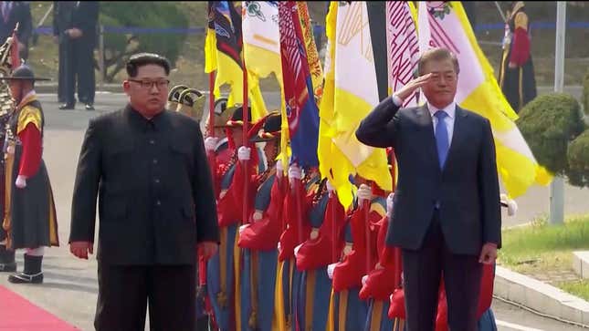 Moon Jae-in salutes next to Kim Jong-un during a ceremony at the Korea summit at the truce village of Panmunjom on April 27.