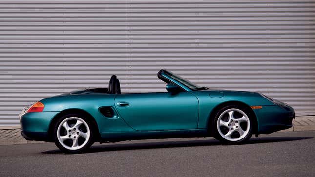 Una foto de un Porsche Boxster  verde azulado.