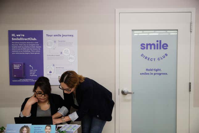 FILE - Dental assistants go over appointments at SmileDirectClub&#39;s SmileShop located inside a CVS store April 24, 2019, in Downey, Calif. SmileDirectClub is shutting down, just months after the struggling teeth-straightening company filed for bankruptcy, leaving existing customers in limbo. On Friday, Dec. 8, 2023, the company said it was unable to find a partner willing to bring in enough capital to keep the company afloat, despite a months-long search. (AP Photo/Jae C. Hong)