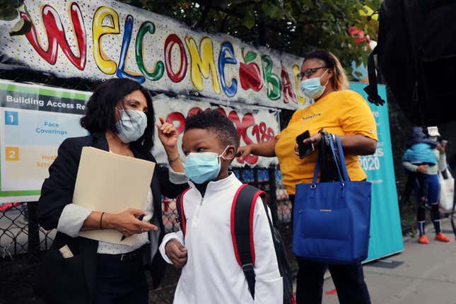 Elementary school students are welcomed back to P.S. 188 as the city’s public schools open for in-person learning on September 29, 2020, in New York City.