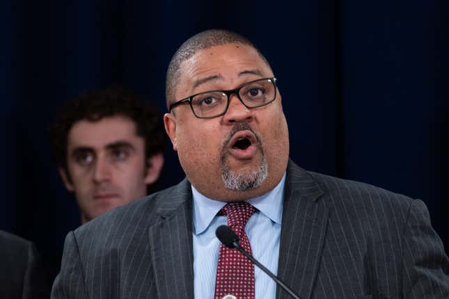 Manhattan D.A. Alvin Bragg stands with members of his staff at a news conference following the conviction of former President Donald Trump.
