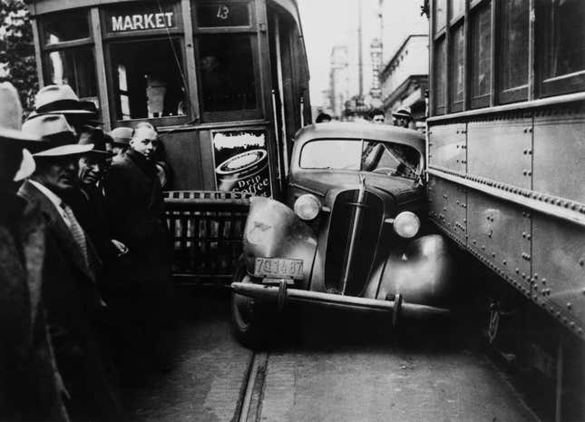 Car Squeezed In Between Two Tramways In United Kingdom