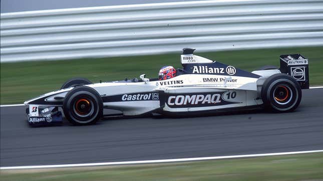 A photo of Jenson Button driving his 2000 Williams F1 car. 