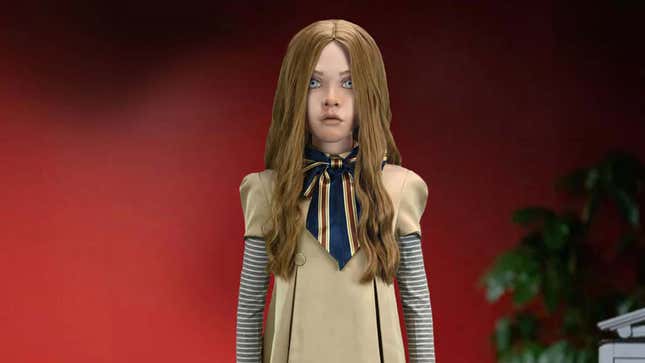An image shows the new Megan doll in a red room. 
