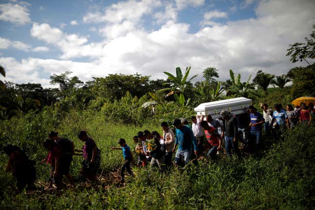 Friends and family carry a coffin with the remains of Jakelin Caal, a 7-year-old girl who handed herself in to US border agents earlier this month and died in the custody of US Customs and Border Protection.