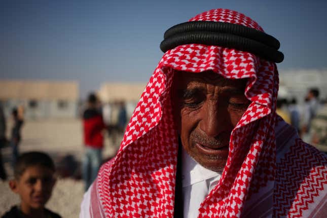 Syrian refugee,Ahmed al Delly, 59, from Daraa in Syria, reacts as he speaks about his wife, four sons, and two daughters, who are still in Daraa, but he has had no contact with them.
