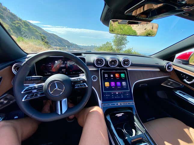 A photo of the driver's POV in the CLE Cabrio with the top down 