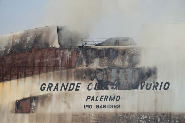 FILE Emergency personnel battle against a fire aboard the Italian-flagged Grande Costa d&#39;Avorio cargo ship at the Port of Newark, Friday, July 7, 2023, in Newark, N.J. On Wednesday, Jan. 10, 2024, the U.S. Coast Guard and the National Transportation Safety Board began a series of investigative hearings into the cause of the fire, and plan to issue recommendations to avoid similar incidents in the future.(AP Photo/John Minchillo)