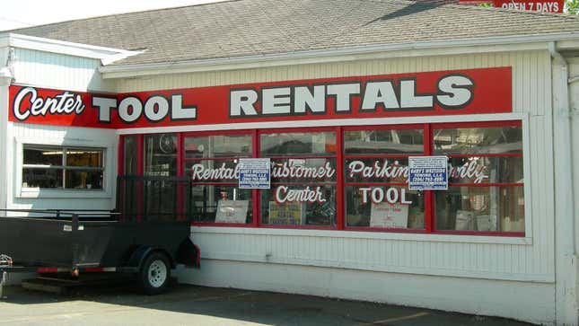 A photo of the red sign above a tool rental store. 