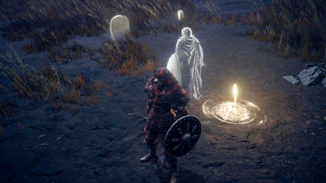 A player character in Elden Ring stands next to a ghostly figure.