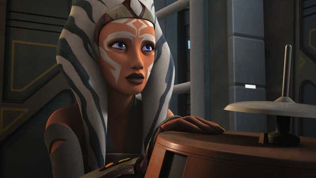 Ahsoka Tano and Chopper together in a scene from Star Wars: Rebels. Ahsoka looks concerned. 