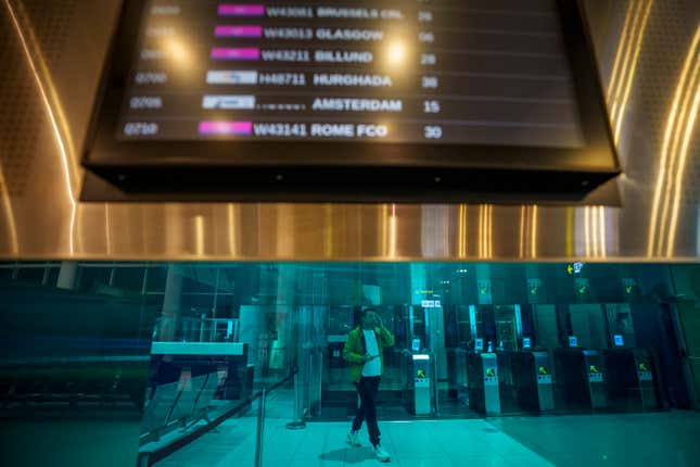 A journalist passes Non-Schengen automatic border control gates during a media tour at the Henri Coanda International Airport in Otopeni, near Bucharest, Romania, Sunday, March 31, 2024. Romania and Bulgaria joined Europe&#39;s passport- and visa-free Schengen Area, applying only to travelers arriving by air and sea. (AP Photo/Andreea Alexandru)