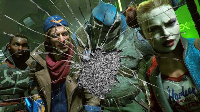An image shows the Suicide Squad behind broken glass. 