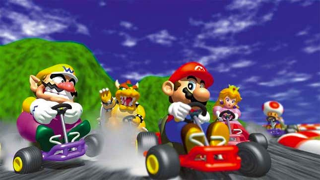 A piece of Mario Kart 64 promotional art shows CG renders of Mario, Wario, and others skidding toward the camera on karts.