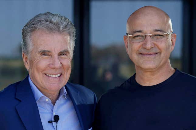 This 2019 photo provided by Cellebrite DI, National Center for Missing &amp; Exploited Children Co-Founder John Walsh (left) and Cellebrite DI Co-Founder Yossi Carmil meet in Israel in 2019. Cellebrite will donate money and its digital tools to nonprofits helping missing and exploited children as part of its &quot;Operation Find Them All&quot; initiative. (Courtesy of Cellebrite DI via AP)