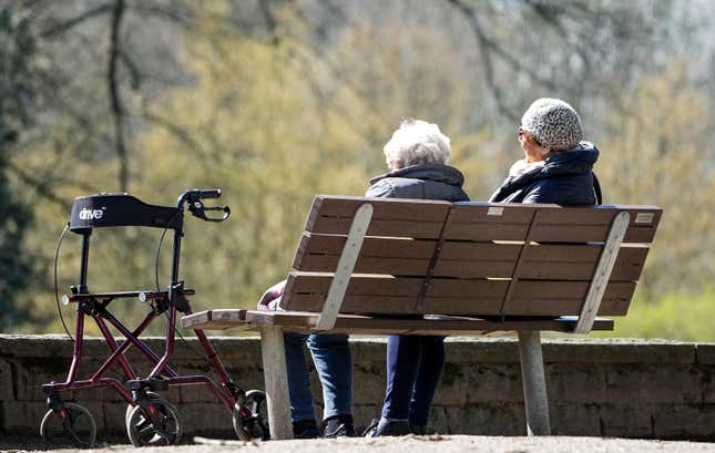 FILE - Elderly women sit on a bench beside their walker in the sun at a park in Gelsenkirchen, Germany, Wednesday, April 5, 2023. Germany&#39;s Cabinet on Wednesday, April 24, 2024, approved a 4.57% rise in retirees&#39; pensions from this summer, an increase that is well above the current rate of inflation. (AP Photo/Martin Meissner, File)