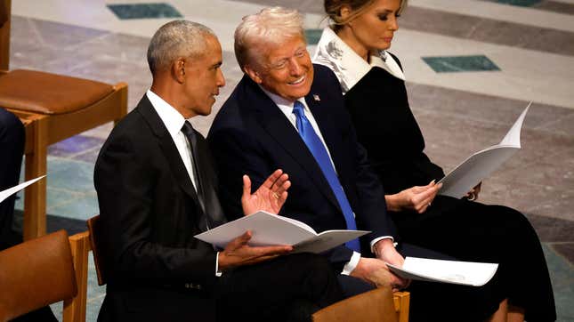 WASHINGTON, DC - JANUARY 09: U.S. President-elect Donald Trump speaks with former U.S. President Barack Obama as Melania Trump looks on during the state funeral for former U.S. President Jimmy Carter at Washington National Cathedral on January 09, 2025 in Washington, DC. President Joe Biden declared today a national day of mourning for Carter, the 39th President of the United States, who died at the age of 100 on December 29, 2024 at his home in Plains, Georgia.