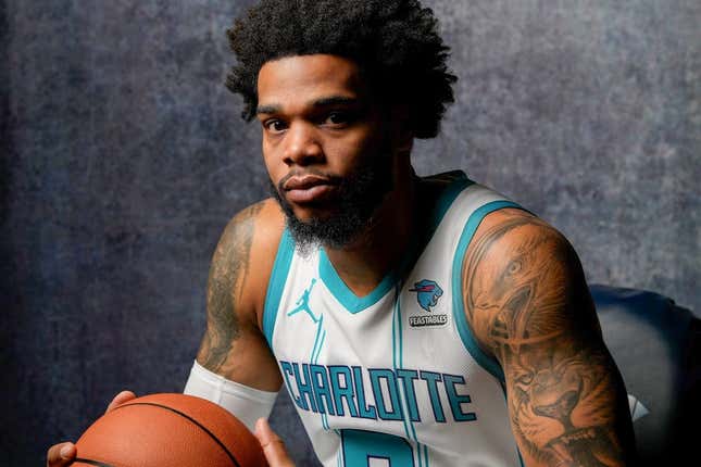 Oct 2, 2023; Charlotte, North Carolina, USA;  Charlotte Hornets Miles Bridges (0) poses for a photo during Charlotte Hornets Media Day at the Spectrum Center.