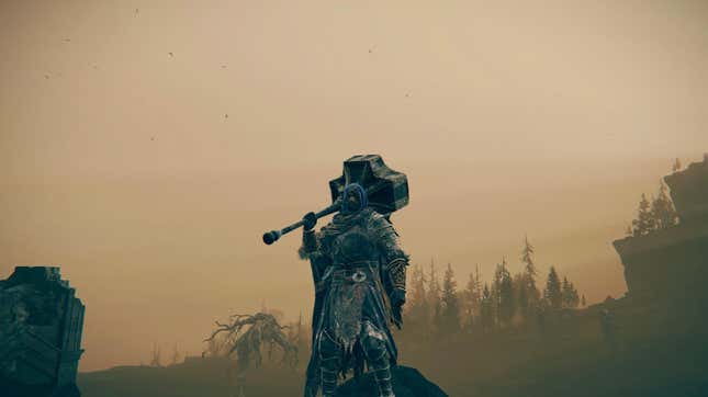 A figure from Elden Ring stands in front of a hazy sky with a large hammer over his shoulder.