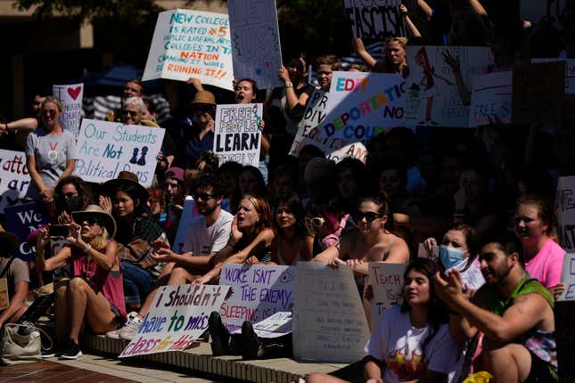 New College of Florida students and supporters protest ahead of a meeting by the college’s board of trustees, Tuesday, Feb. 28, 2023, in Sarasota, Fla.