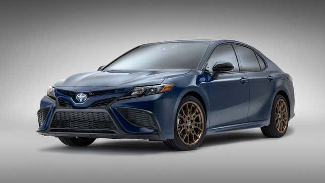 A photo of a blue 2023 Toyota Camry sedan. 