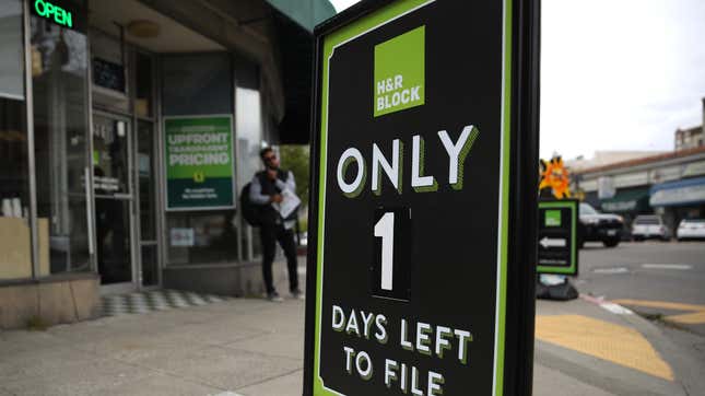 A sign for H&R Block reading Only 1 Days Left to File in front of a H&R Block Shop