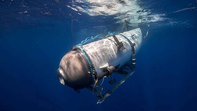 A photo of the OceanGate submarine diving below the surface. 