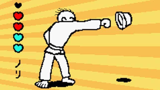 A man punching a hat.