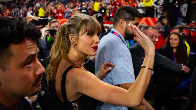 Taylor Swift on the field after the Kansas City Chiefs defeated the San Francisco 49ers in Super Bowl LVIII 