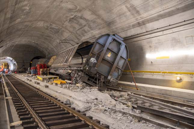 Accident-damaged freight wagons are seen at the scene of the accident in the Gotthard base tunnel near Faido during a media tour at the accident site on Wednesday, Sept. 6, 2023 in Faido in the canton of Ticino. Switzerland’s national rail operator said Thursday, Nov. 2, 2023, the world’s longest rail tunnel won&#39;t be fully reopened to train traffic until next September, again pushing back the target date for repairs of damage caused by a cargo train derailment. The Swiss federal railway operator, known by its German-language acronym SBB, said the damage from the Aug. 10 derailment in the Gotthard tunnel, Switzerland’s main north-south rail thoroughfare, is “much more significant than first imagined.” (Urs Flueeler/Keystone via AP)