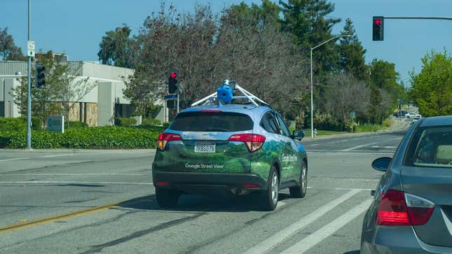 Google Street View vehicle with equipment for recording 360 degree images for the Google Maps platform, driving down a street in the Silicon Valley, Mountain View, California, May 3, 2019.