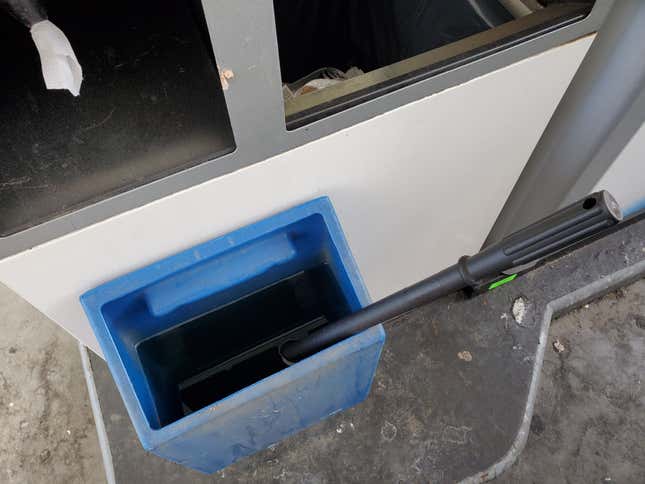 High-angle view of windshield squeegee for washing windshields of a car at a gas station, July 21, 2020. 