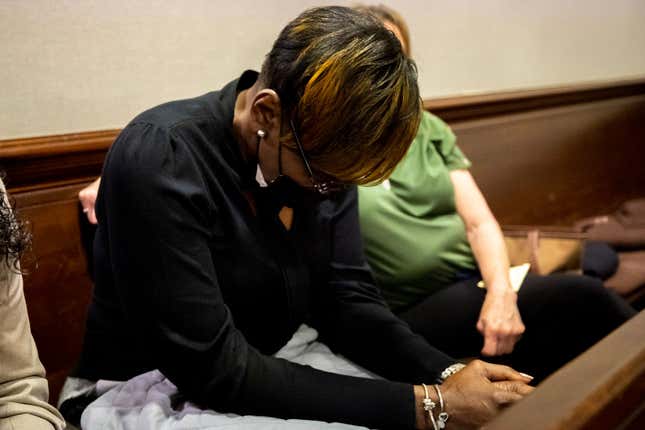 Ahmaud Arbery’s mother Wanda Cooper-Jones reacts to autopsy photos entered into evidence during the trial of Greg McMichael and his son, Travis McMichael, and a neighbor, William “Roddie” Bryan in the Glynn County Courthouse on November 16, 2021 in Brunswick, Georgia.