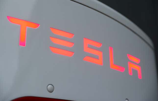 Tesla logo at a Tesla Supercharger station