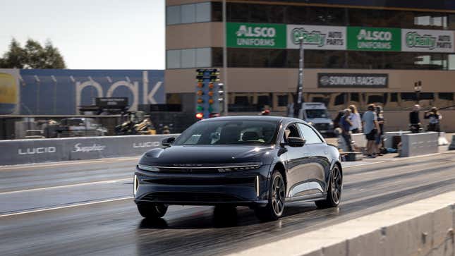 A Lucid Air Sapphire does a hard launch at a drag strip.