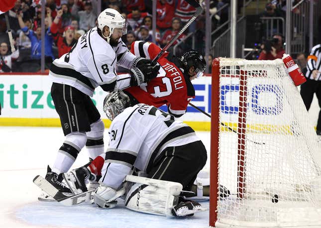 NEWARK, NEW JERSEY - FEBRUARY 15: Tyler Toffoli #73 of the New Jersey Devils scores a goal as David Rittich #31 and Drew Doughty #8 of the Los Angeles Kings defend during the second period at Prudential Center on February 15, 2024 in Newark, New Jersey. (Photo by Elsa/Getty Images)