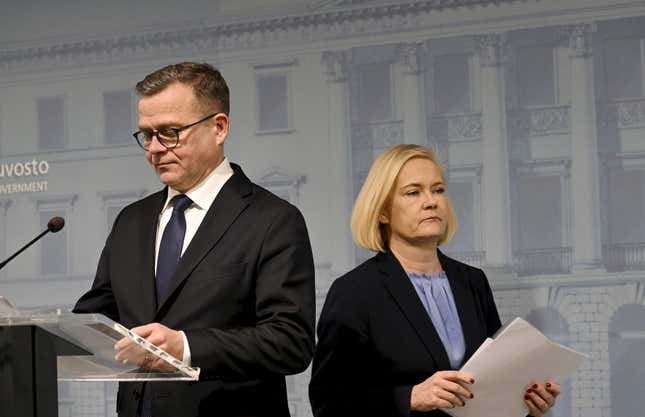 Finnish Prime Minister Petteri Orpo, left, and Interior Minister Mari Rantanen at a press conference in Helsinki, Finland on Tuesday, Dec. 12, 2023. Finland closed two weeks ago all checkpoints on border with Russia because of flow of third country migrants via Russia. (Markku Ulander/Lehtikuva via AP)